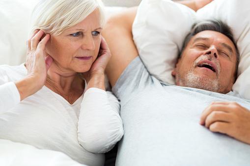 9 Ways To Sleep With A Snorer